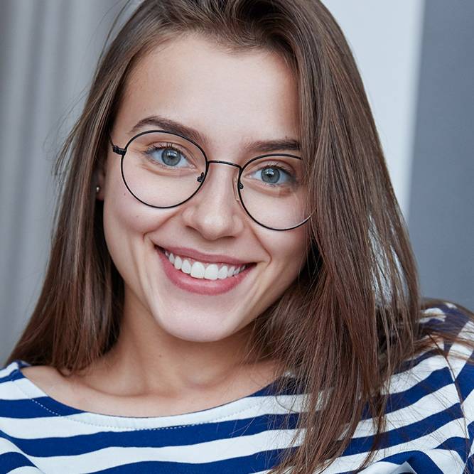 Young woman dressed in summer outfit out in the city